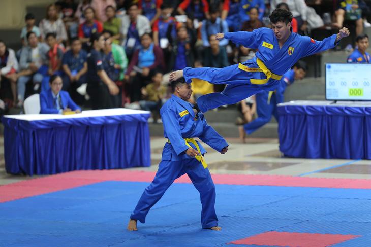 Đội tuyển vovinam Việt Nam thi đấu nội dung quyền tại Giải vovinam Đông Nam Á 2023 - Ảnh: Lê Giang Đội tuyển vovinam Việt Nam thi đấu nội dung quyền tại Giải vovinam Đông Nam Á 2023 - Ảnh: Lê Giang