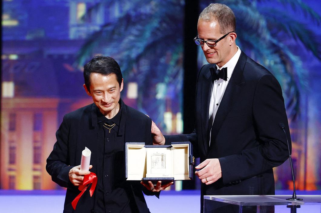 Xúc động với hai tài năng điện ảnh người Việt tại Cannes - Ảnh 2. Đạo diễn Trần Anh Hùng và ông Pete Docter, giám đốc sáng tạo Hãng Pixar - Ảnh: Reuters