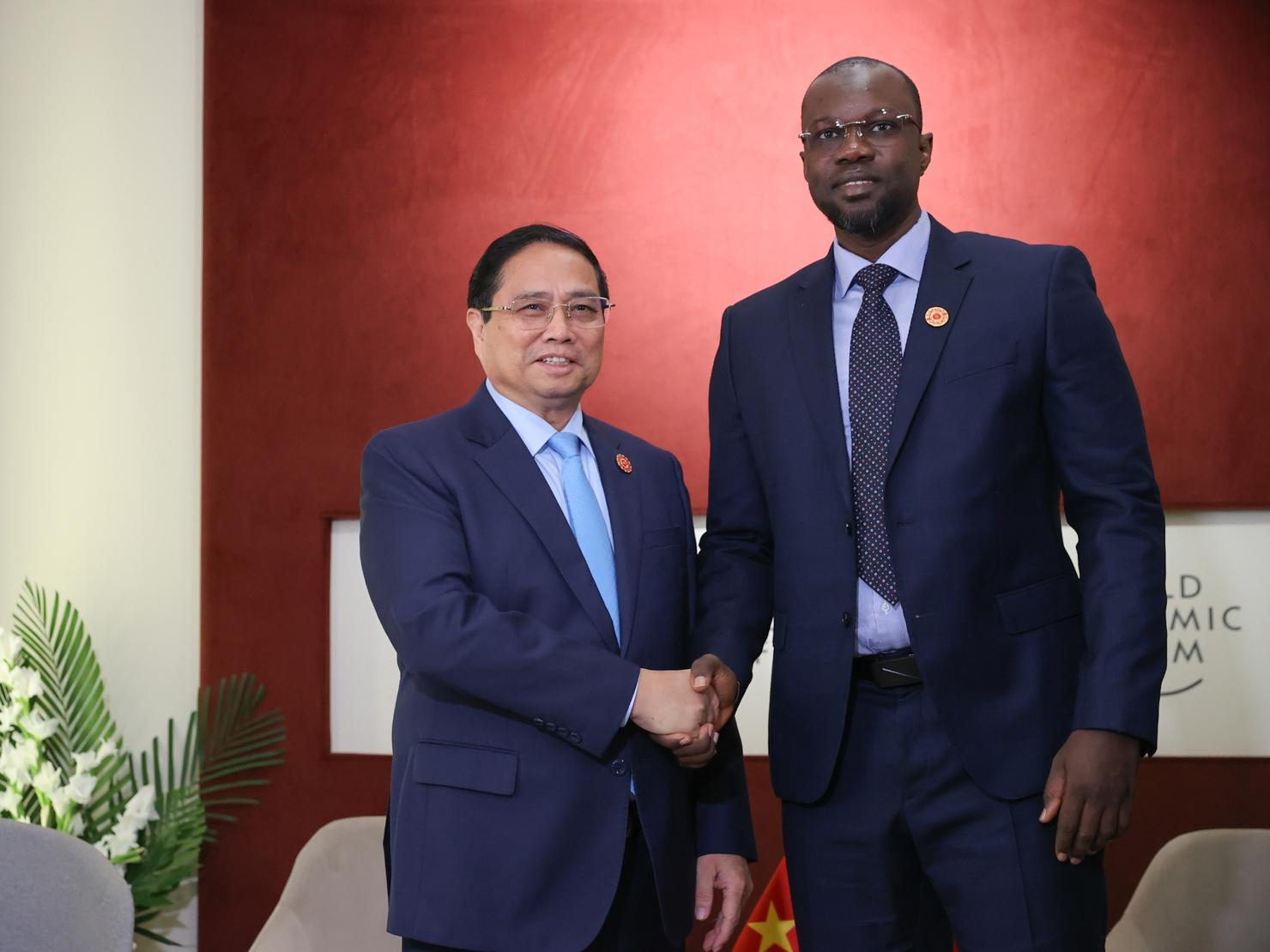 Thủ tướng Phạm Minh Chính và Thủ tướng Senegal Ousmane Songko. Ảnh: VGP/Nhật Bắc