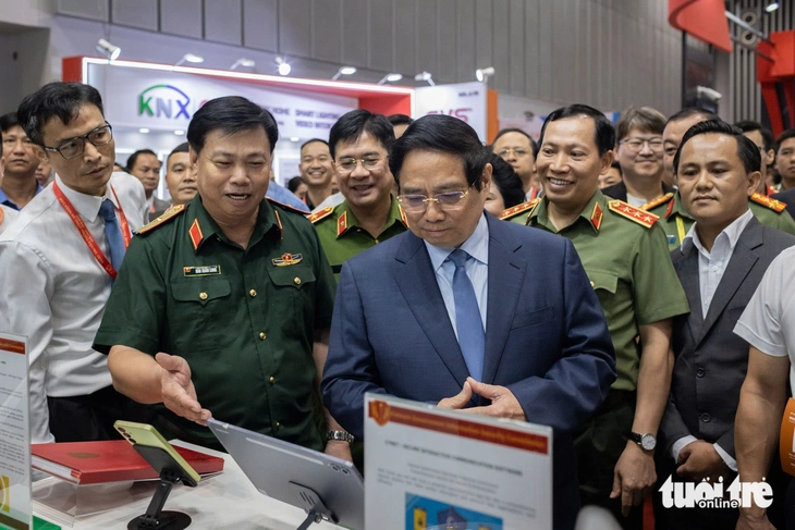 Thủ tướng Phạm Minh Chính dự triển lãm quốc tế về kỹ thuật và phương tiện phòng cháy chữa cháy - Ảnh 2.